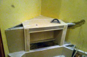 Обшивка каркаса углового камина